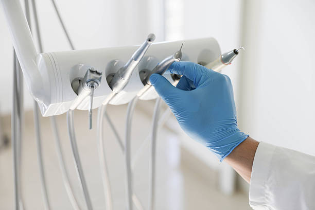Professional Tooth Extraction technician working in Gillespie, IL